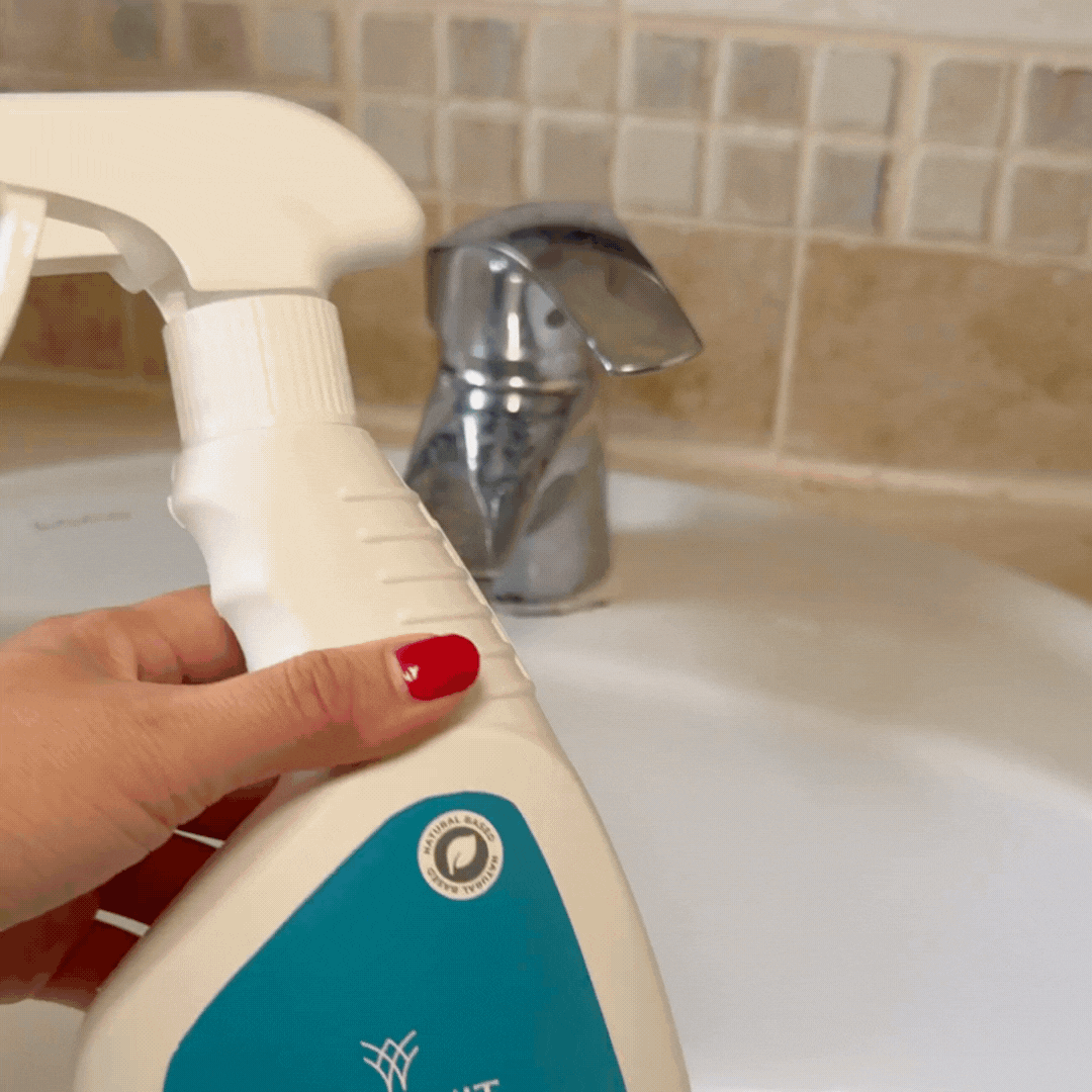 surface cleaner and disinfectant on bathroom sink.gif